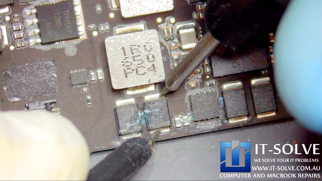 Measuring suspected capacitor lines on liquid damaged Macbook